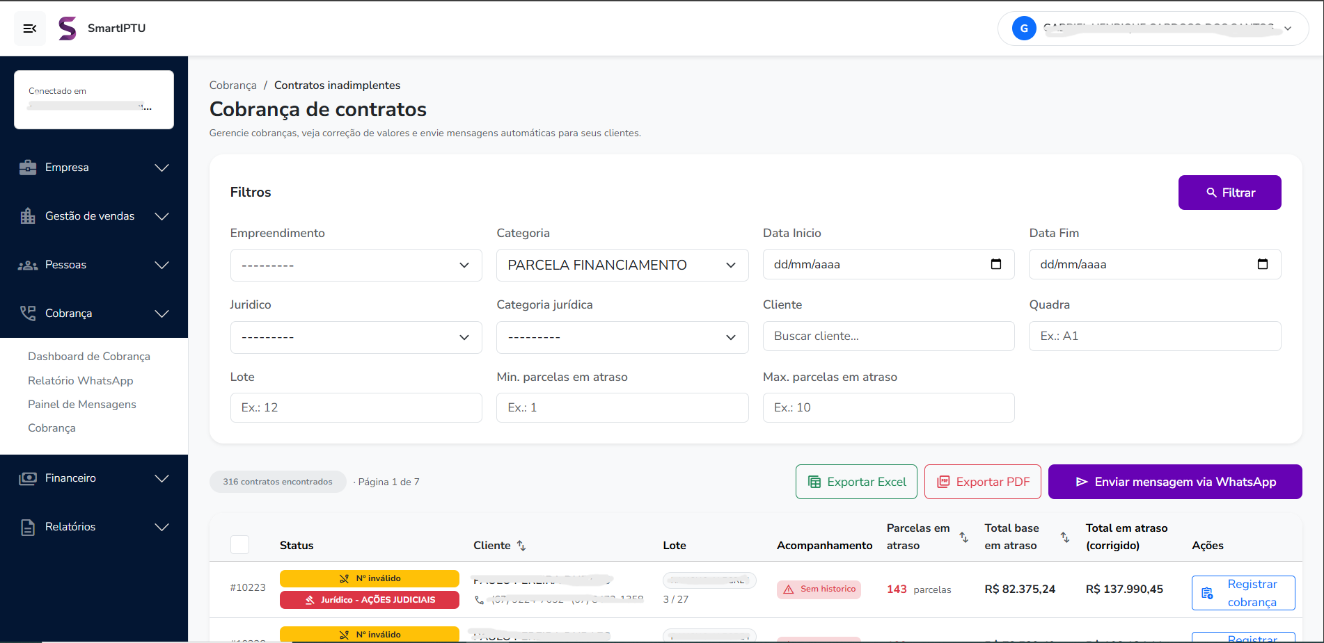Tela de cobrança com contratos inadimplentes e envio por WhatsApp
